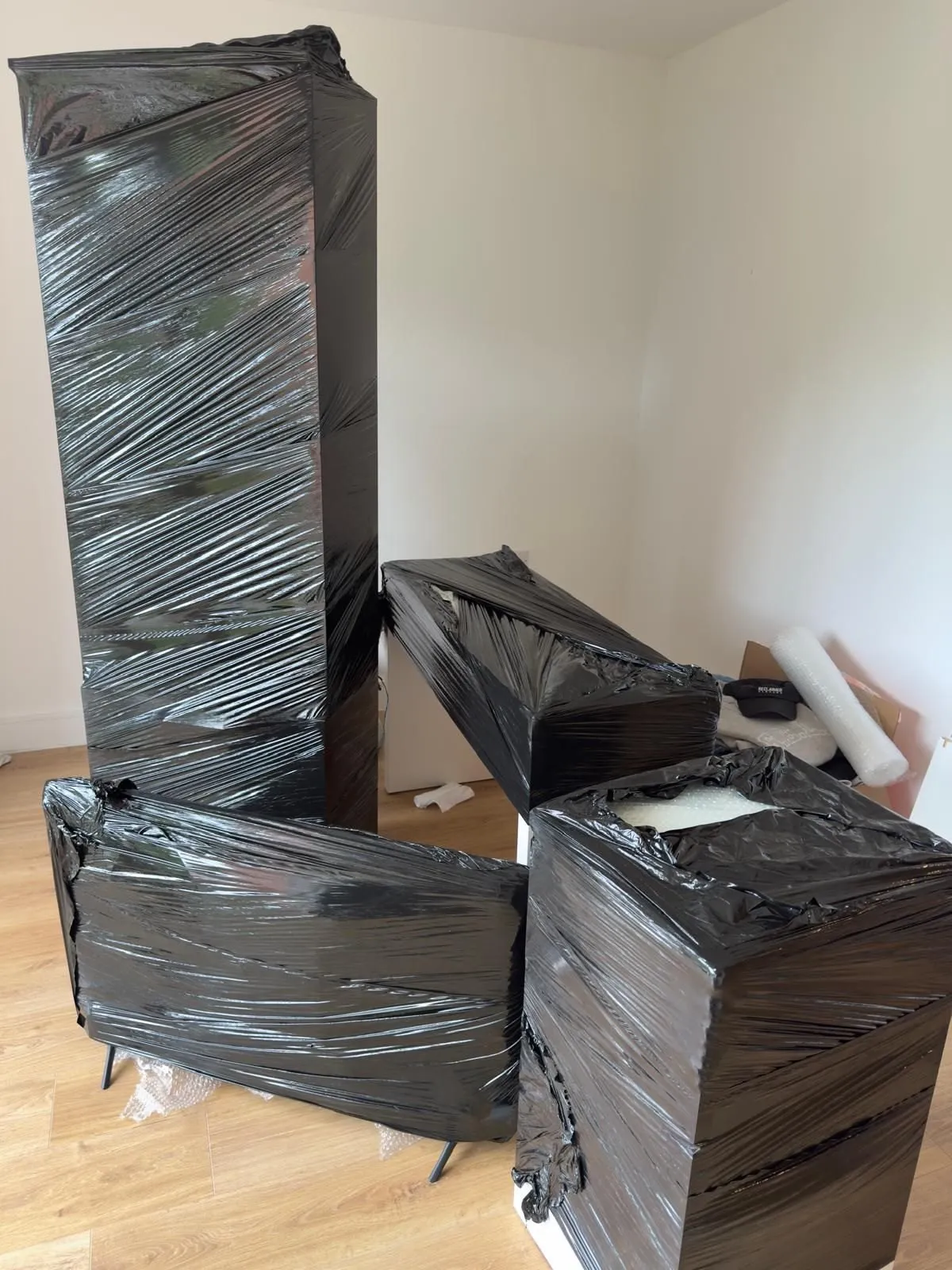Wrapped furniture loaded in a removal van, furniture removals in Bradford
